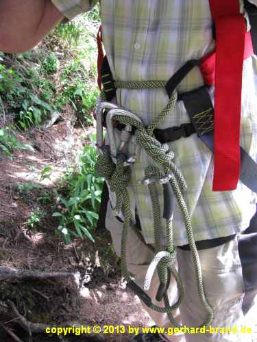 Picture 27: Wearing the climbing equipment