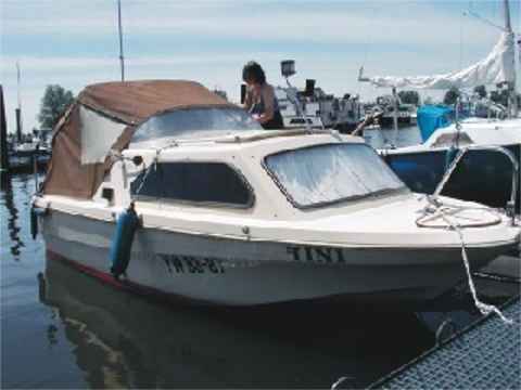 Picture 12: The motorboat Shetland Family Four / side-face